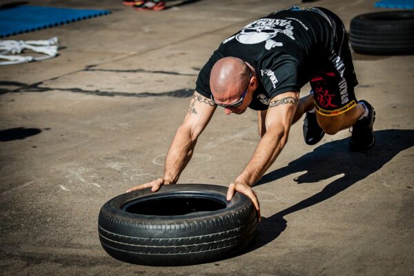 tyre push, tyre workout, training, gym, functional training, tire, tyre, athlete, physical, trainer, crossfit, fitness, brown fitness, brown gym, brown training, brown workout