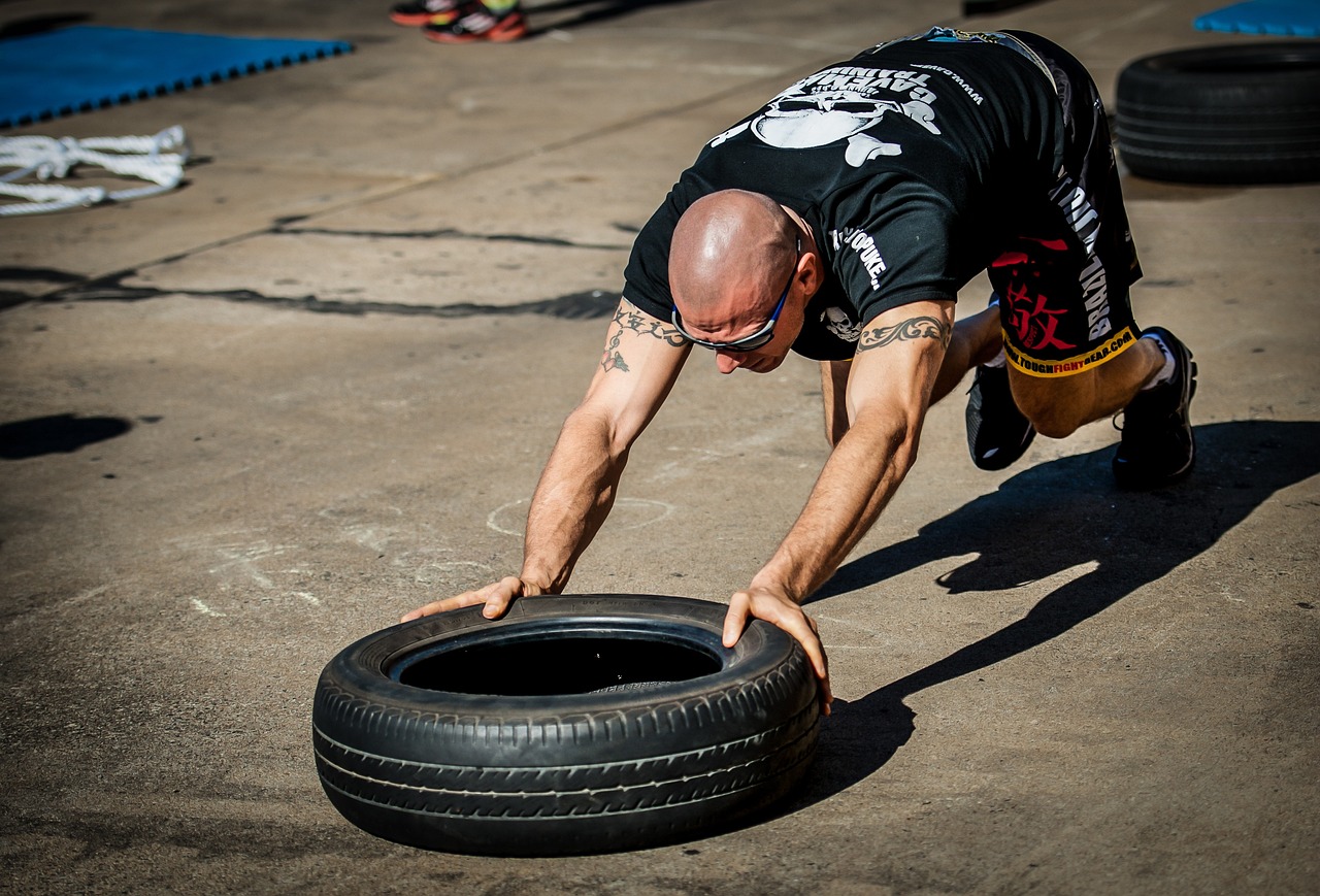 tyre push, tyre workout, training, gym, functional training, tire, tyre, athlete, physical, trainer, crossfit, fitness, brown fitness, brown gym, brown training, brown workout